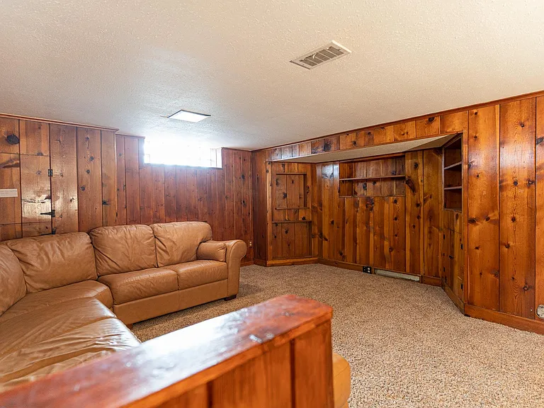 Entertainment area with outlets and coax.