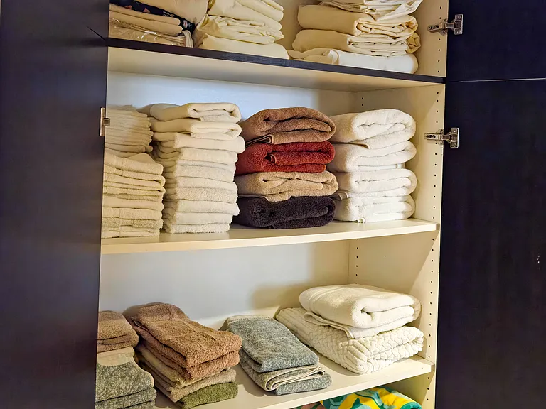 Fully furnished linen closet.