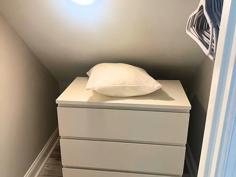Closet space with extra drawers inside.