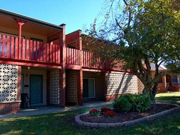 All Brick Building -- Newer double pain windows and patio sl