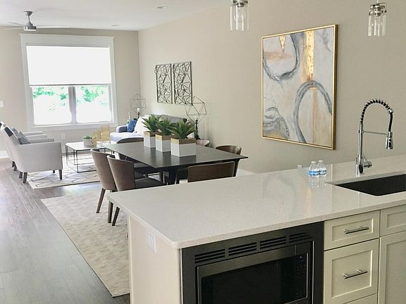 kitchen showing island and DR and LR (A side)