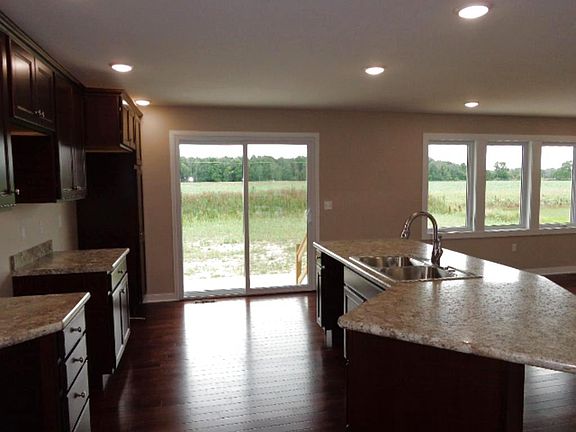 Door accessing patio off kitchen.