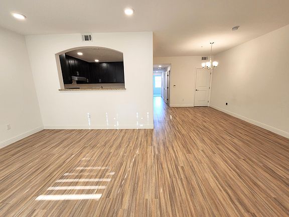 Kitchen, Dining area and Pantry as seen from Living Room