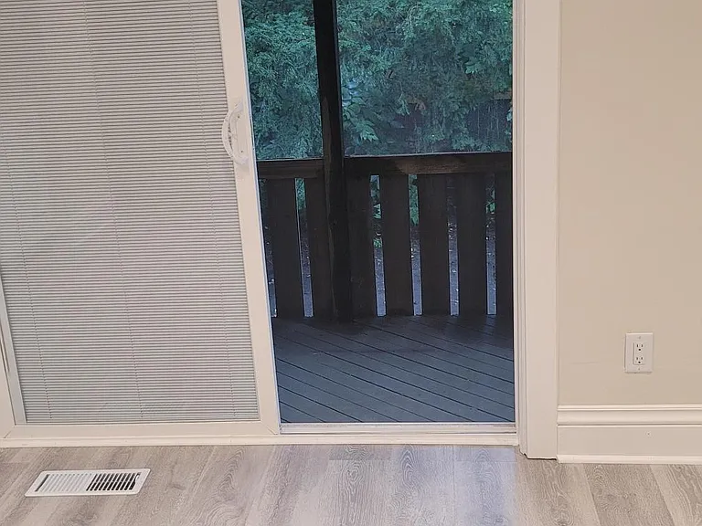 private 5' x 16' side deck view from the 13' x 13' Dining room