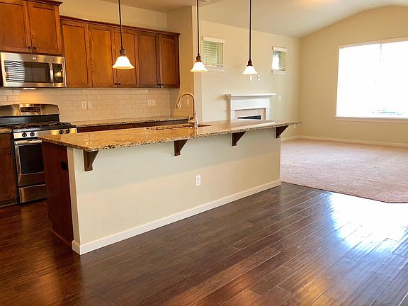 Large kitchen island and lots of cabinet space.