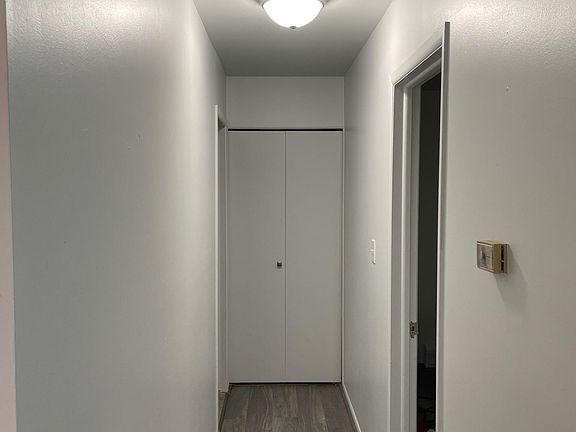 Hallway to bedroom and bathroom
