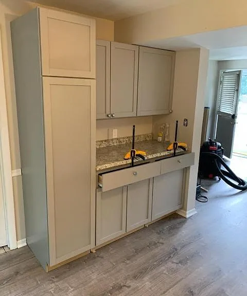 New kitchen with lots of storage and new life proof plank flooring thruout the house.