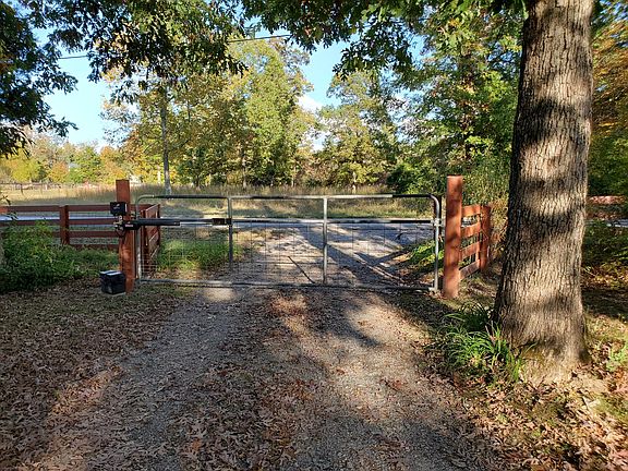 One and half acre yard fenced in with electric gate