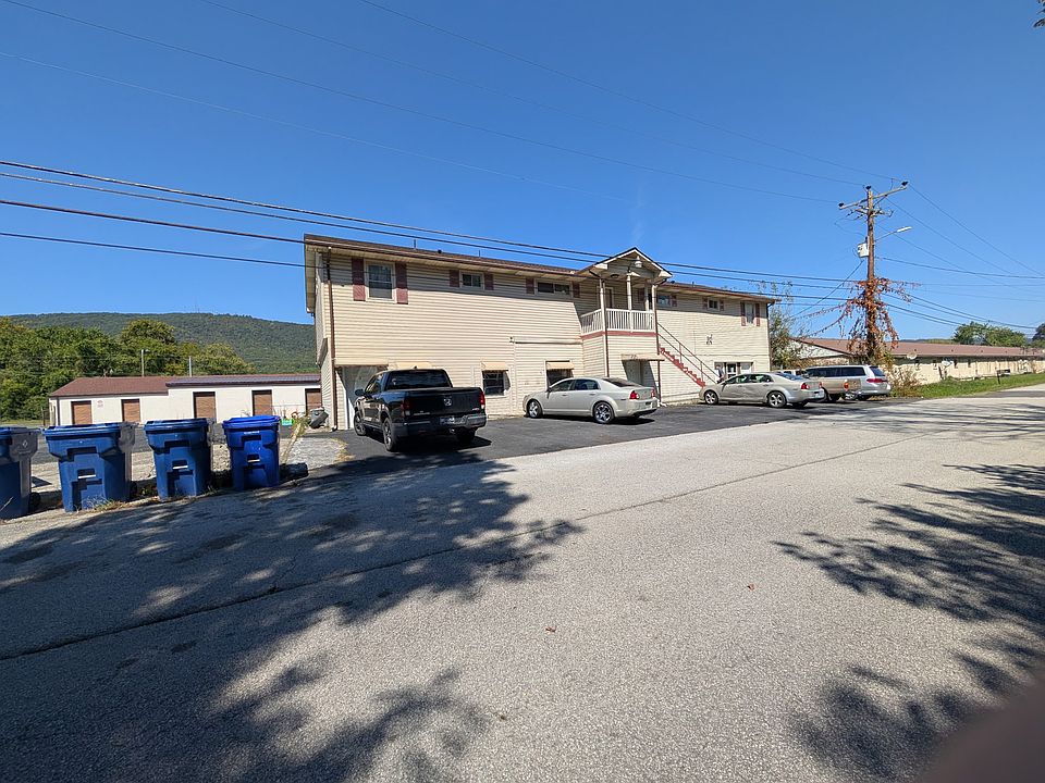 outside front of the building. Unit 3 is on the bottom left