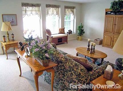 Family Room
						:
						Lower level family room provides lots of living space with lake views!