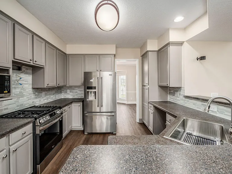 7302 Claddaugh Ln — Photo 17