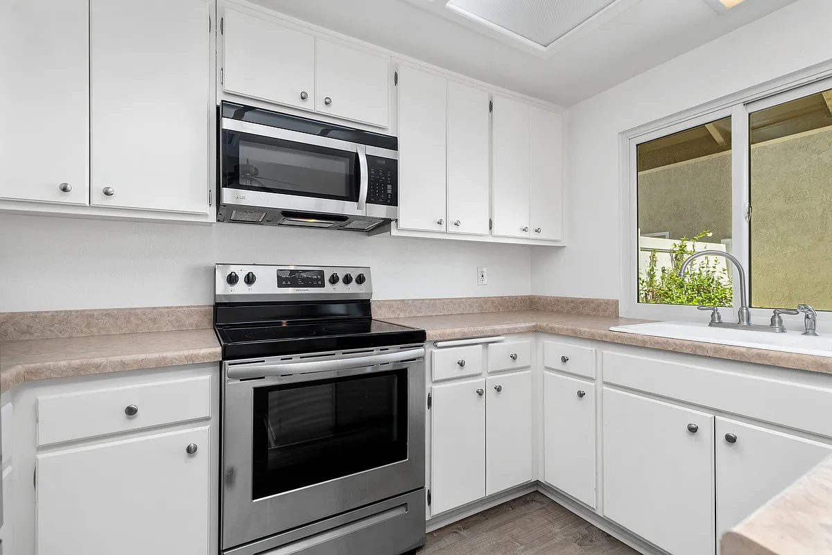 Stainless appliances and tons of storage in kitchen. - 21106 Via Rincon