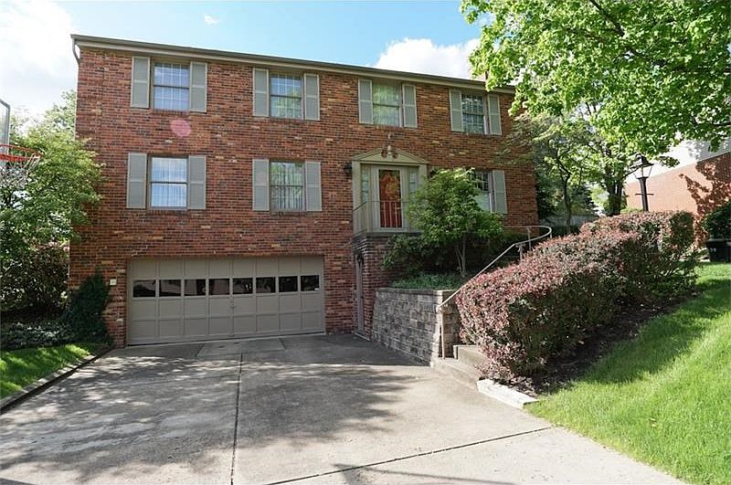 Brick home in Greybrooke! Large flat cement driveway and beautiful flat yard