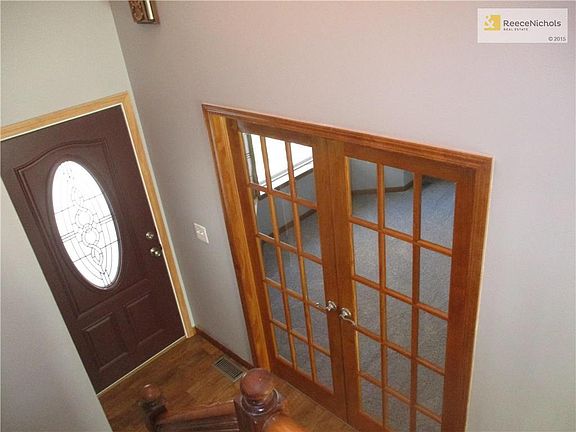An overhead view of the entry and French doors leading to the living room. So charming!