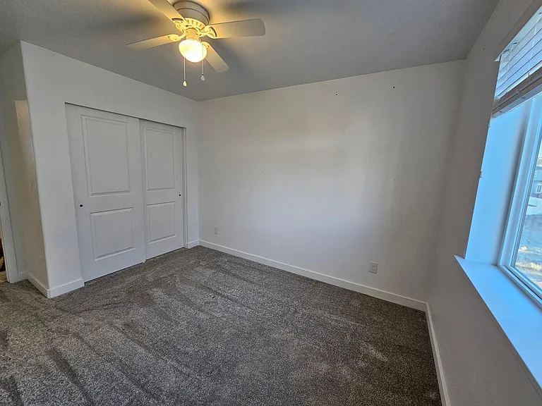 Bedrooms 2,3 and 4 all have large closets and ceiling fans
