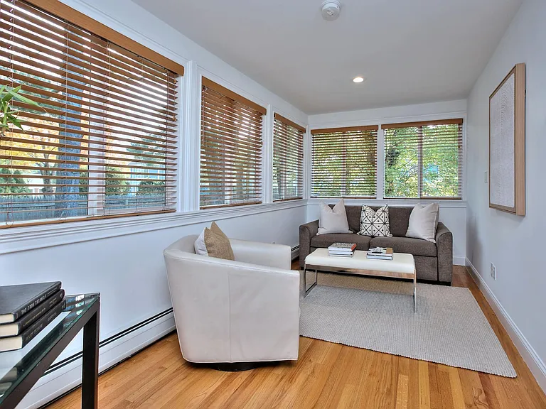 Bright and Light Den on the Main Floor, off the Living Room.