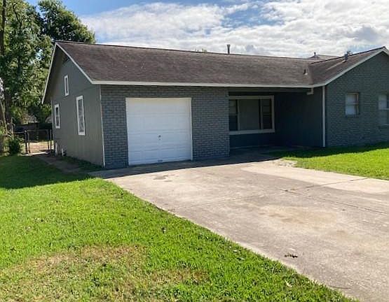 Home has new siding and fresh paint.