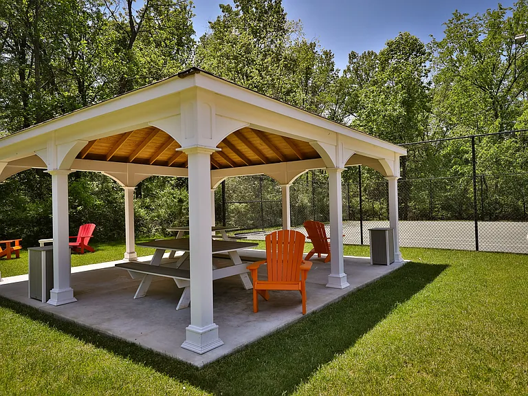 Escape to tranquility at The Woods at Ambler, an Eagle Rock Community. Enhance your outdoor living with our inviting gazebo, perfect for gatherings or relaxation. Embrace the comfort of natureschedule your visit today!
