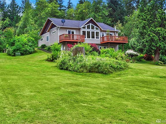 View of the home as you approach on the driveway.