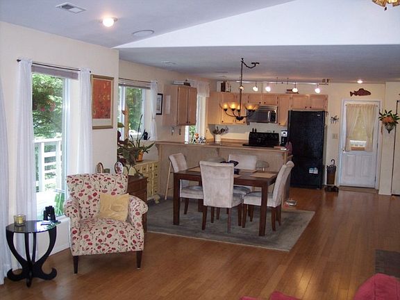 The new, bamboo floors and extensive updates extend into the open kitchen.