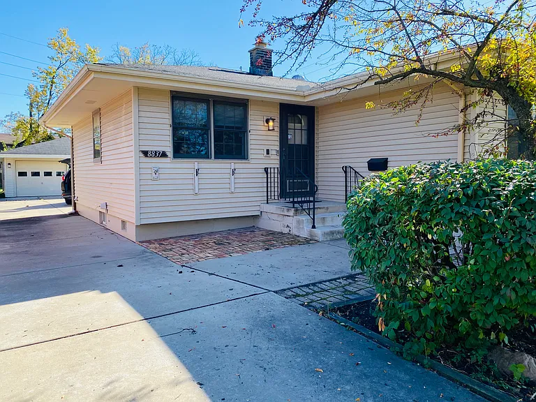 8837 Manor Ave — Photo 2