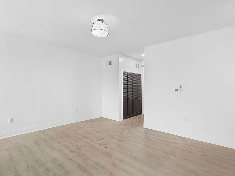 Spacious living room with luxury vinyl plank flooring