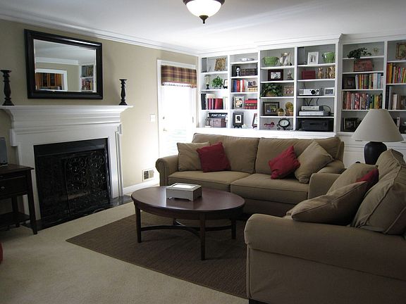 Spacious Living Room with Fireplace and built-in book shelves