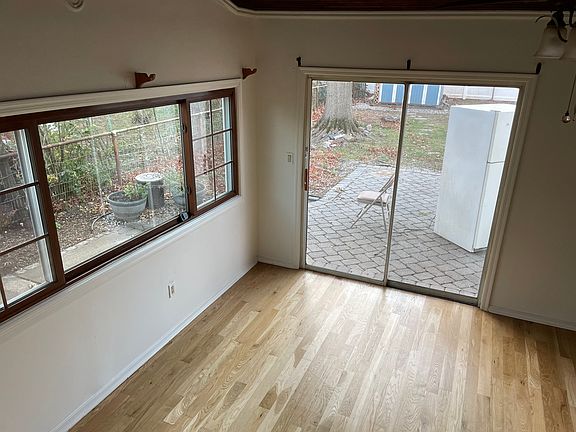 sliding patio door in family room view from kitchen arch way