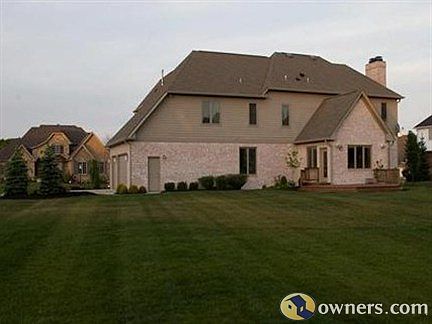 Rear view of home from the property