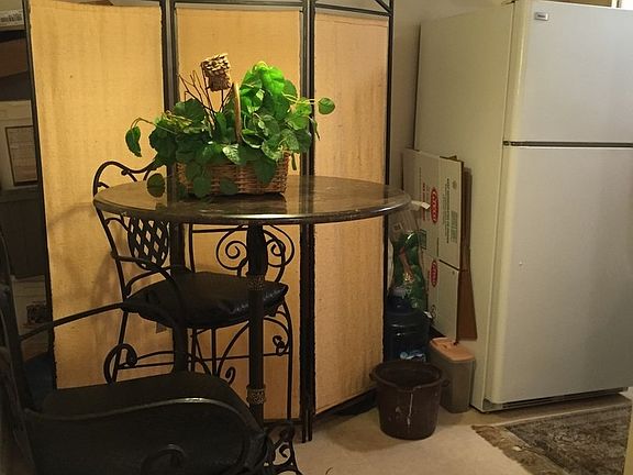 Breakfast nook off the kitchen. (Photos taken when seller lived there)