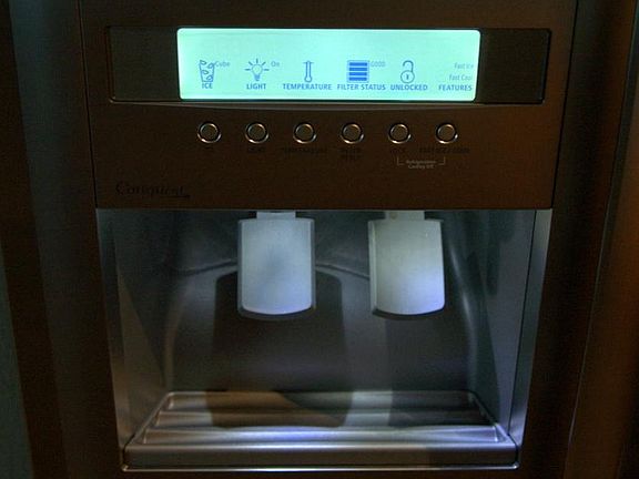 Lit Ice and filtered cold water dispenser provides either crushed or cubed ice