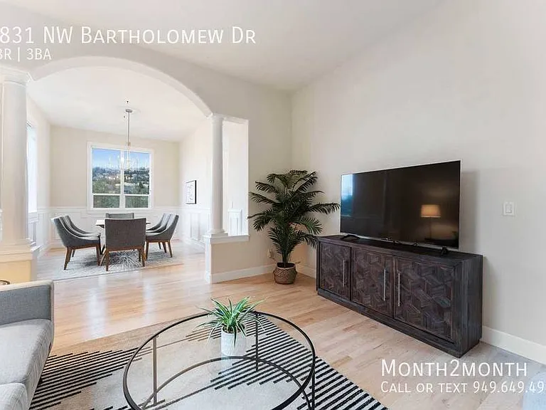 9831 NW Bartholomew Dr — Photo 3