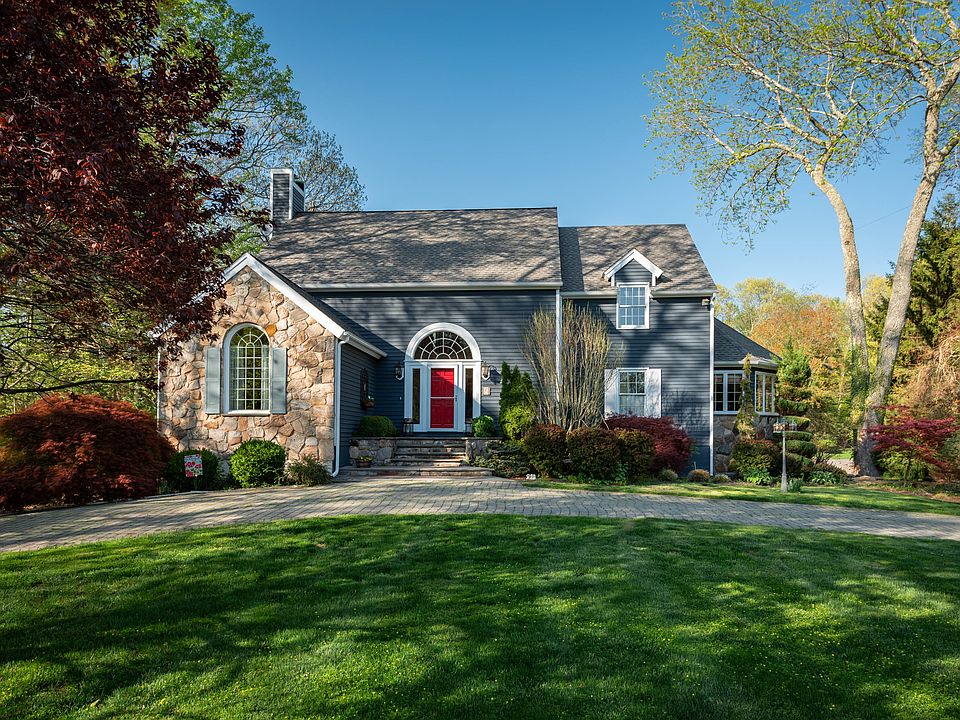 8 Hedge Brook Lane located on a cul de sac of fine homes