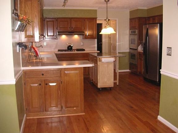 Remodeled kitchen w/ SS designer appliances and corian counters