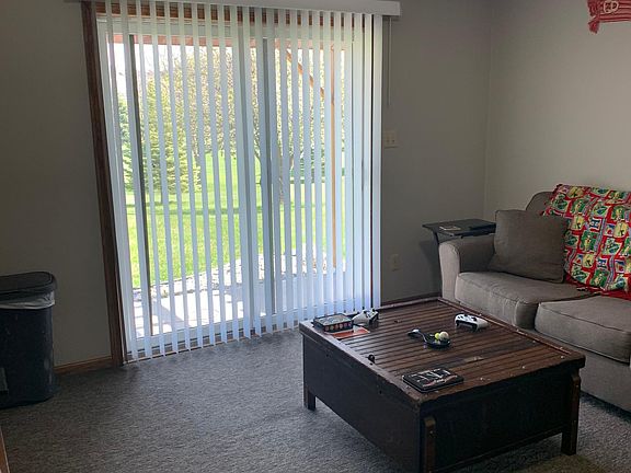 Living room downstairs and lower patio