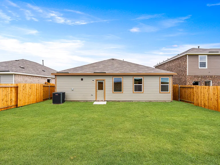 The back yard of the Reed is fully fenced-in.