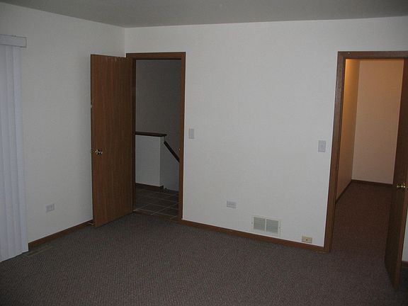 Master bedroom with walk-in-closet. New wood flooring not s