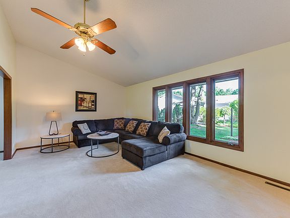 Large living room with vaulted ceilings. 