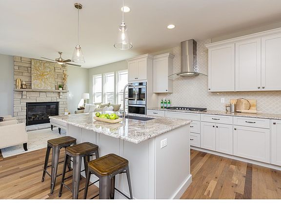 Kitchen Open To The Hearth Room