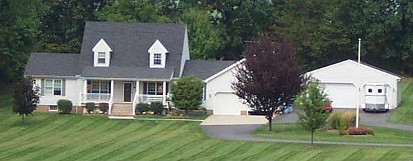 7.5 acres w/ barn & pond