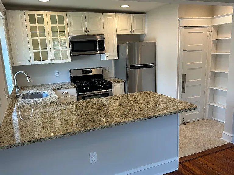 Stainless Steel Appliances, Recessed Lighting & Granite Counter Tops.