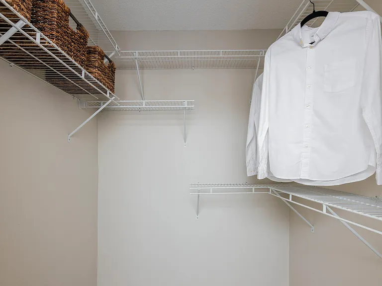 Beachway Links delivers unmatched organization in our deep walk-in closets with open-wire shelving to maximize your space! You'll find plenty of room for all of your clothes, storage and more!