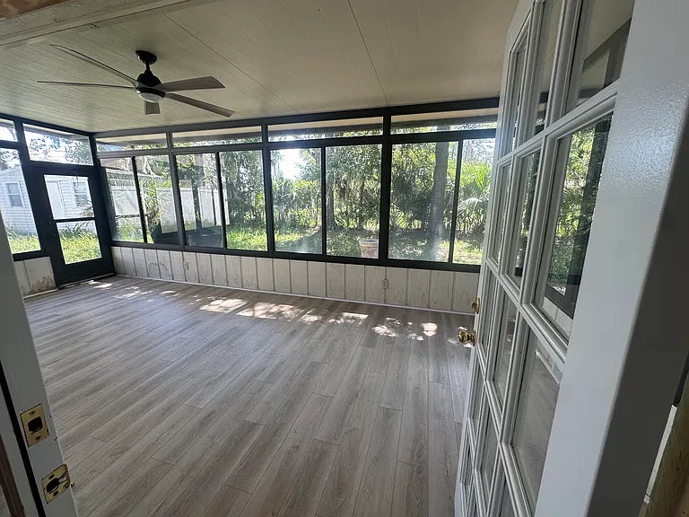 sunroom with AC unit, fully livable space