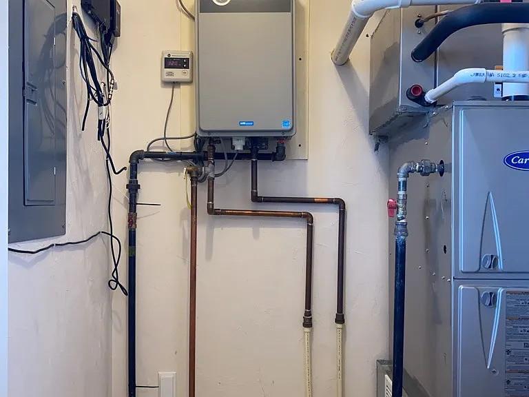 Utility Closet
- Every Unit has standalone utility closet that includes: Individual Breaker Box, Instant Hot Water, Forced Hot Air & Central AC