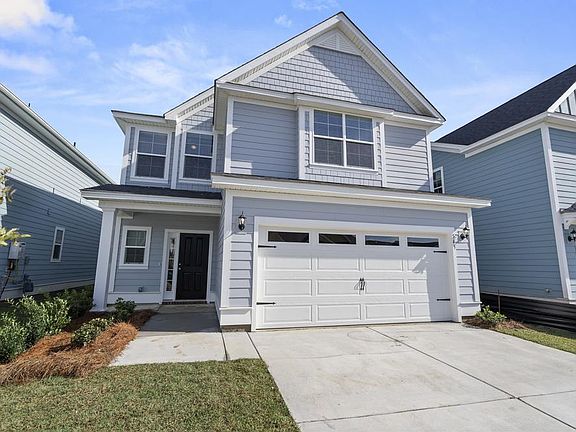 Photos are of a similar home