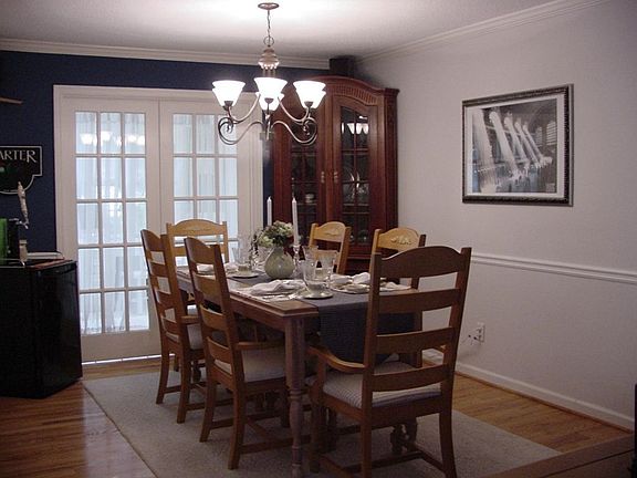 Spacious Dining area features hardwood floors.