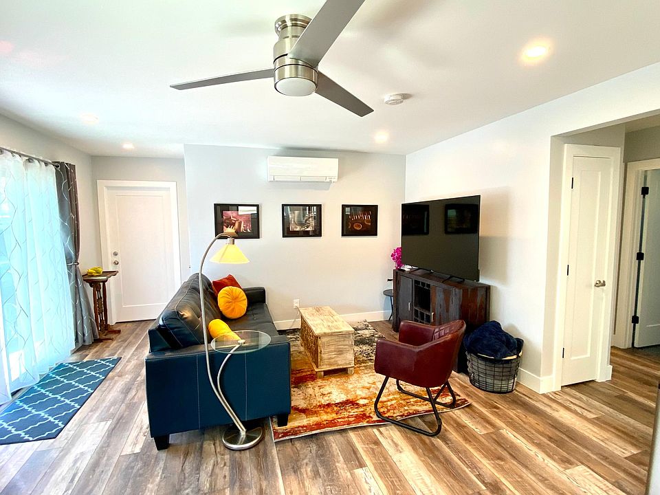 Leather sofa with Queen Sized foldout bed and smart Tv