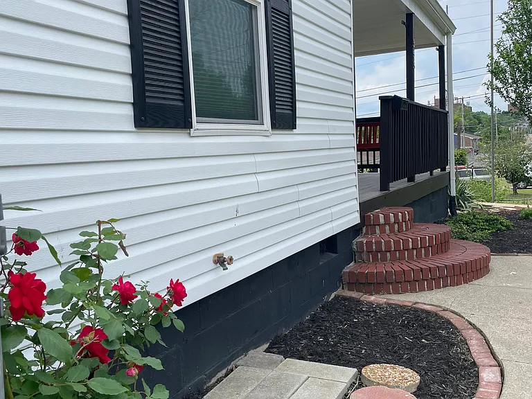 Entrance from the carport.