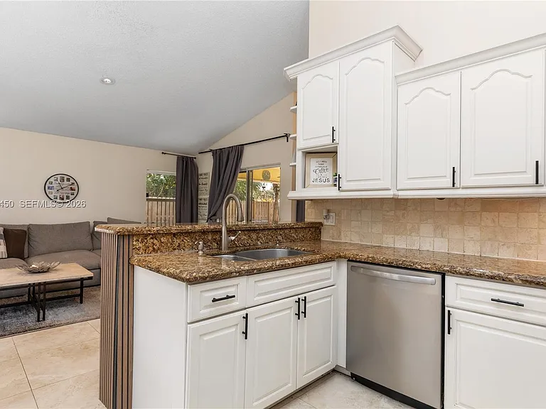 7171 NW 44th Ln — Photo 8