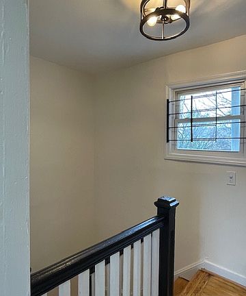 Top of stairway leading to hallway